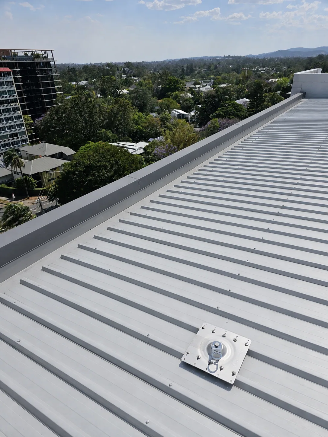 Matching after view of the maintained commercial metal roof perimeter