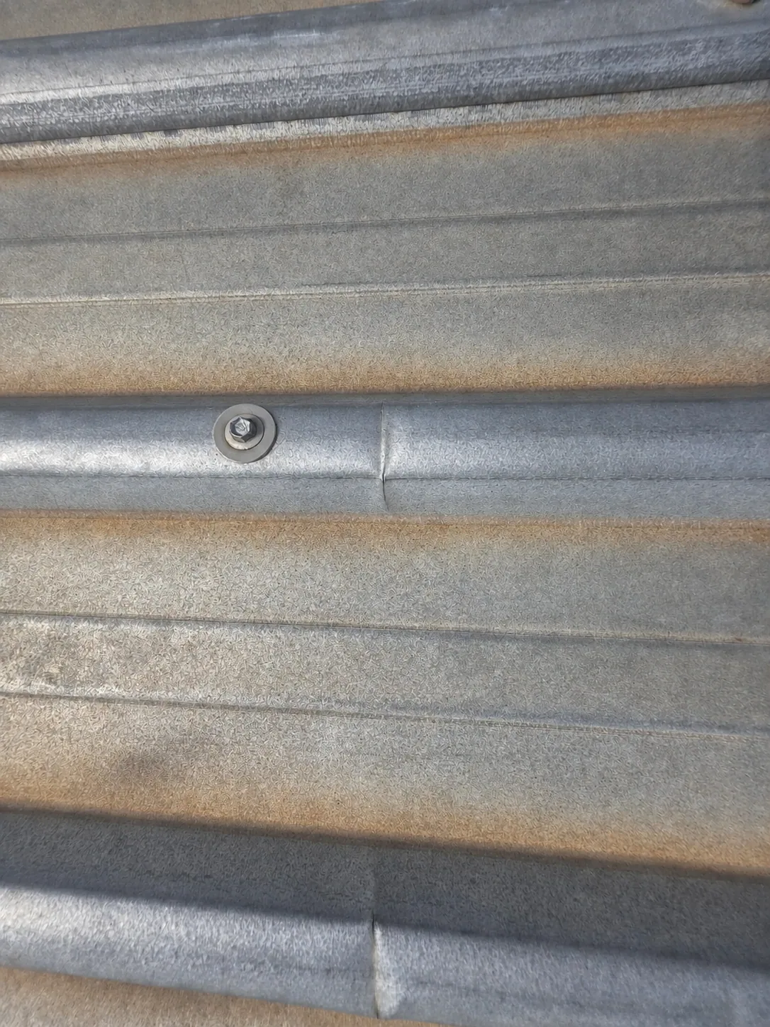 Matching after view of the renewed metal roof fixing