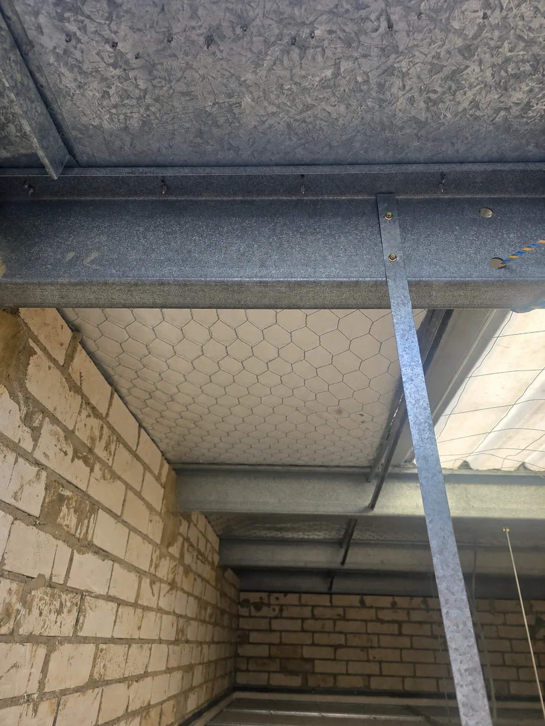 Matching after view of the repaired roof underside area