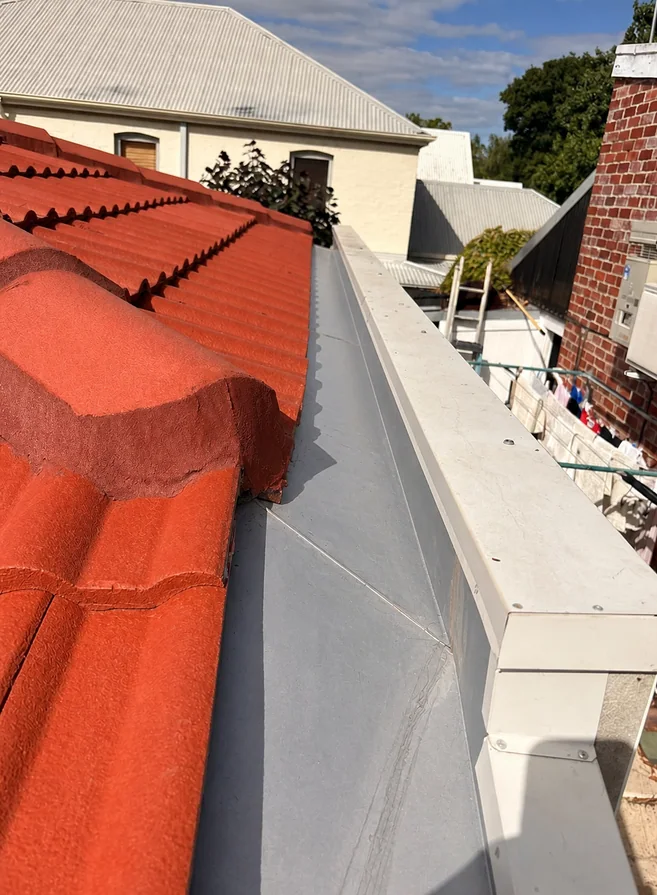 Same roof valley clean and unobstructed after maintenance