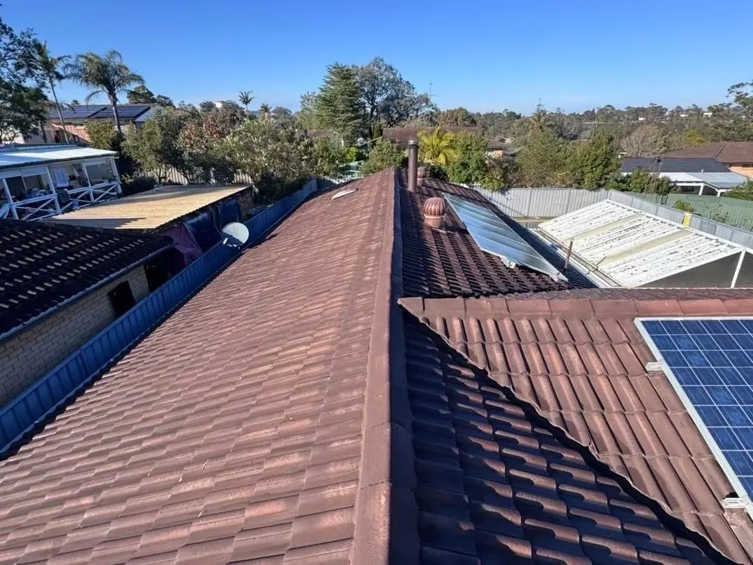 Faded brown concrete tile roof before restoration